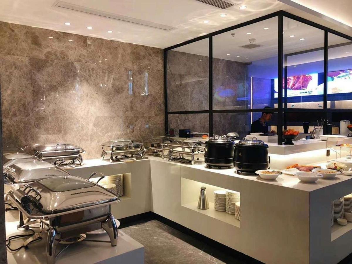 Tian Yi International Hotel 天艺国际酒店 Phnom Penh Bagian luar foto